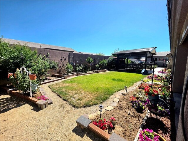 4132 Monte Silvano Ct, Kingman, AZ 86401 - fenced backyard with a gazebo and a vegetable garden