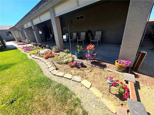 4132 Monte Silvano Ct, Kingman, AZ 86401 - view of green lawn with a patio