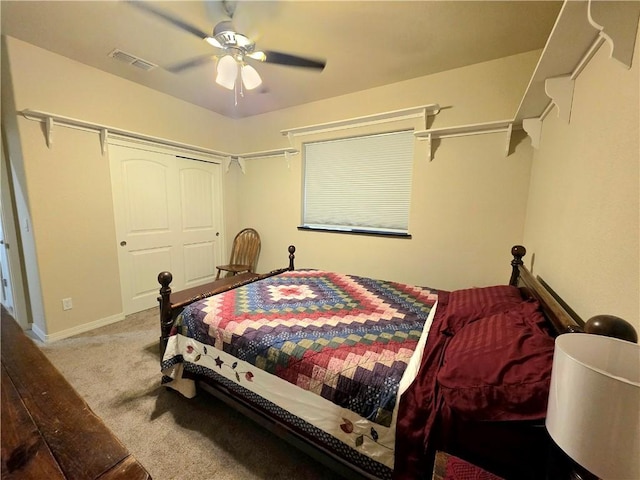 4132 Monte Silvano Ct, Kingman, AZ 86401 - bedroom with carpet floors, a ceiling fan, and a closet