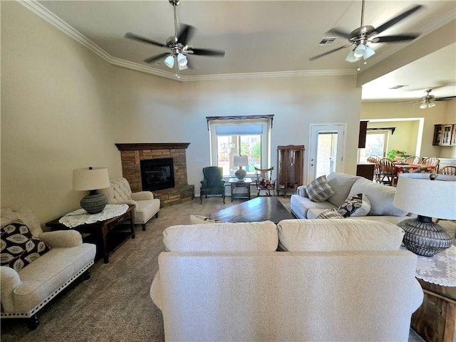 4132 Monte Silvano Ct, Kingman, AZ 86401 - living room with a ceiling fan, ornamental molding, carpet flooring, and healthy amount of natural light