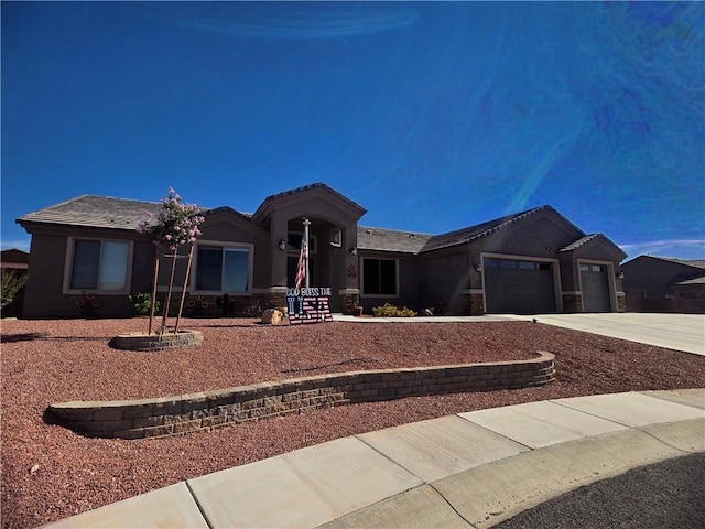 4132 Monte Silvano Ct, Kingman, AZ 86401 - ranch-style home with driveway, a garage, and stucco siding