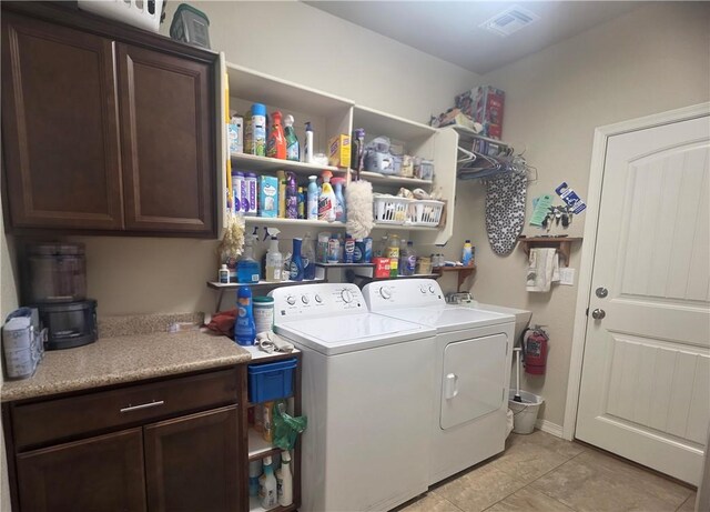 4132 Monte Silvano Ct, Kingman, AZ 86401 - laundry room with washer and dryer, cabinet space, and light tile patterned floors