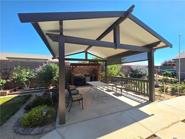 4132 Monte Silvano Ct, Kingman, AZ 86401 - fenced backyard featuring a gazebo and a patio