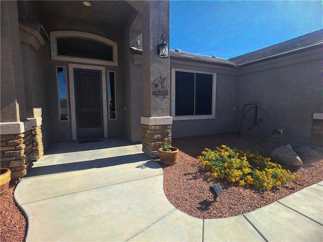 4132 Monte Silvano Ct, Kingman, AZ 86401 - entrance to property with stone siding and stucco siding