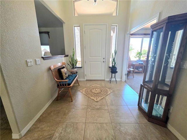 4132 Monte Silvano Ct, Kingman, AZ 86401 - entrance foyer featuring a textured wall and tile patterned floors