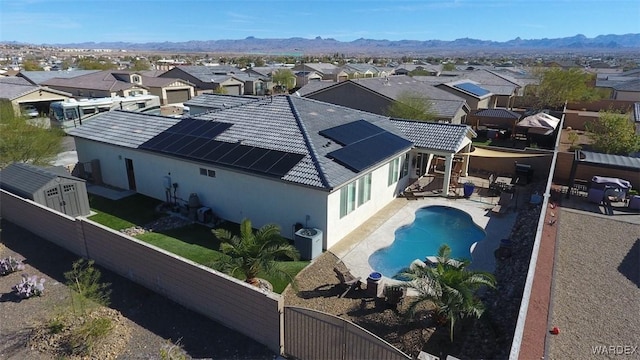 birds eye view of property featuring a residential view and a mountain view