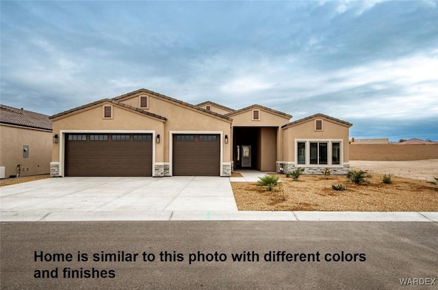 view of front of house featuring stone siding, stucco siding, an attached garage, and concrete driveway