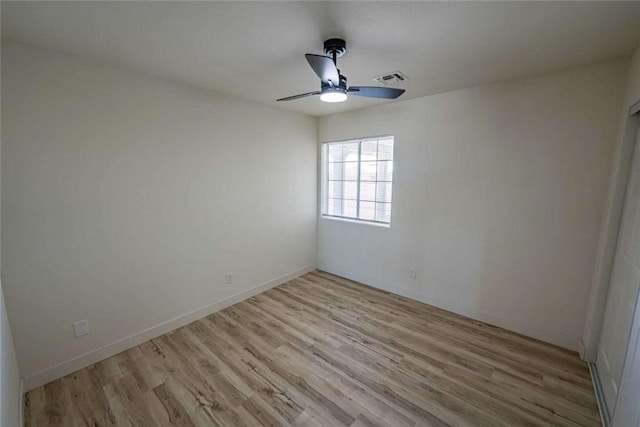 1925 E Ln Entrada Pl, Fort Mohave, AZ 86426 - empty room with ceiling fan and light wood-style flooring