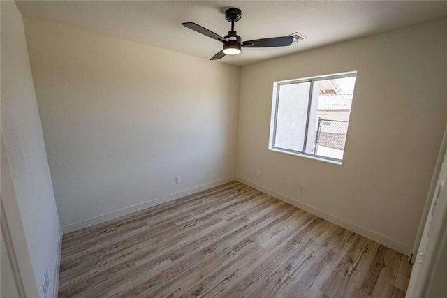 1925 E Ln Entrada Pl, Fort Mohave, AZ 86426 - unfurnished room featuring light wood finished floors and ceiling fan
