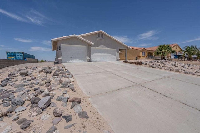1925 E Ln Entrada Pl, Fort Mohave, AZ 86426 - ranch-style house with a garage, stucco siding, concrete driveway, and a tiled roof