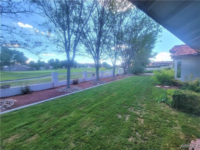 view of yard with fence