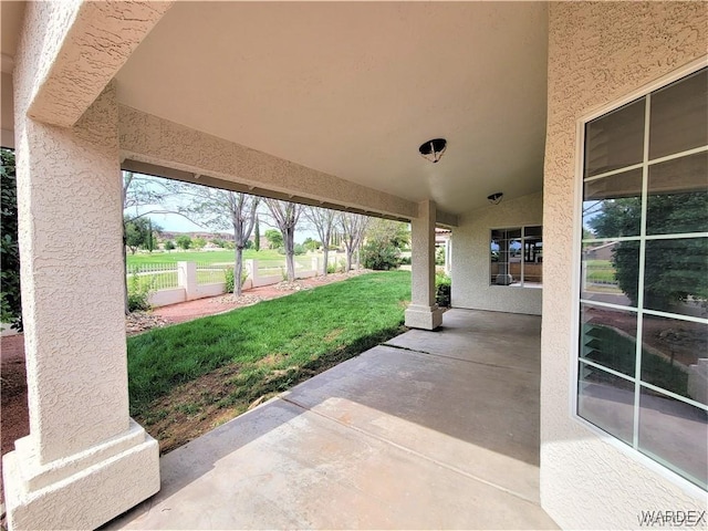 view of patio / terrace with fence