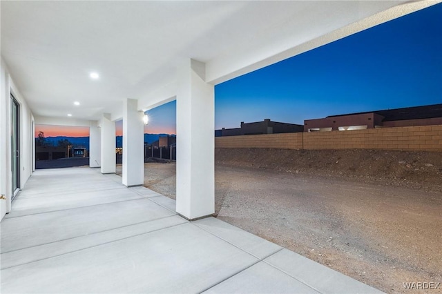 view of patio / terrace featuring fence