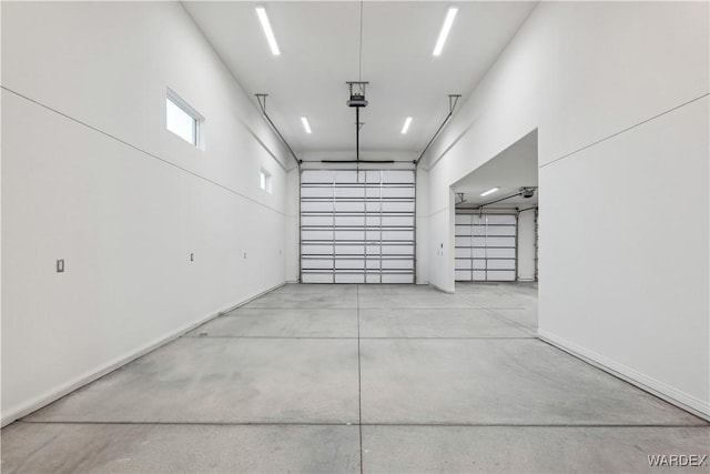 garage featuring baseboards