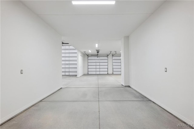 garage with baseboards