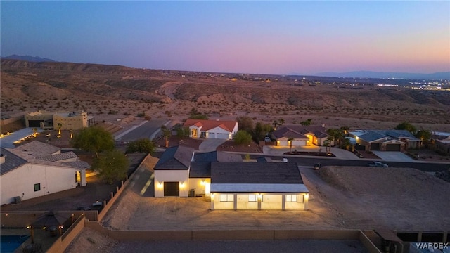 aerial view at dusk with a residential view