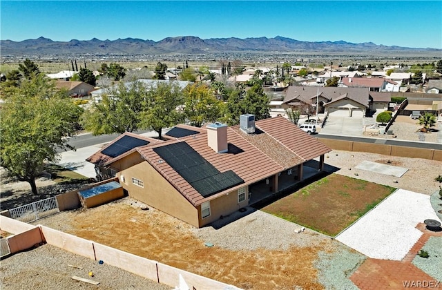 bird's eye view with a residential view and a mountain view