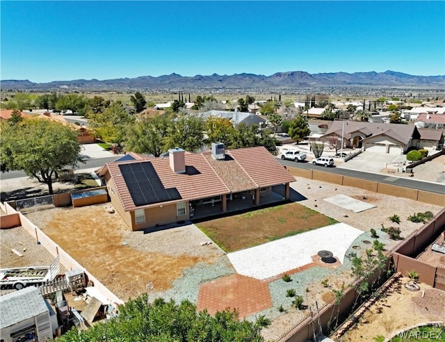 bird's eye view with a residential view and a mountain view