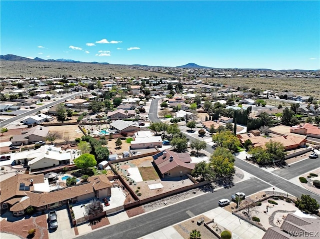 bird's eye view with a residential view and a mountain view