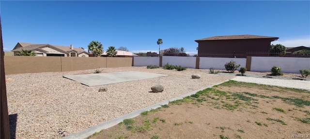 view of yard featuring a fenced backyard and a patio