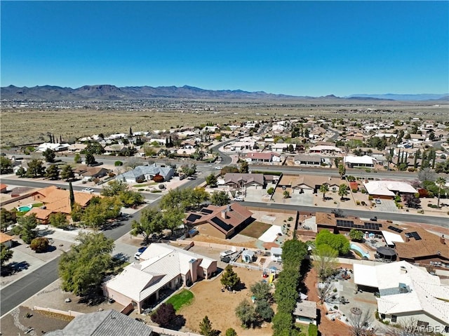 bird's eye view with a residential view and a mountain view