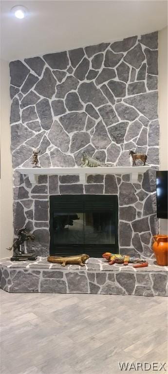 details featuring a stone fireplace