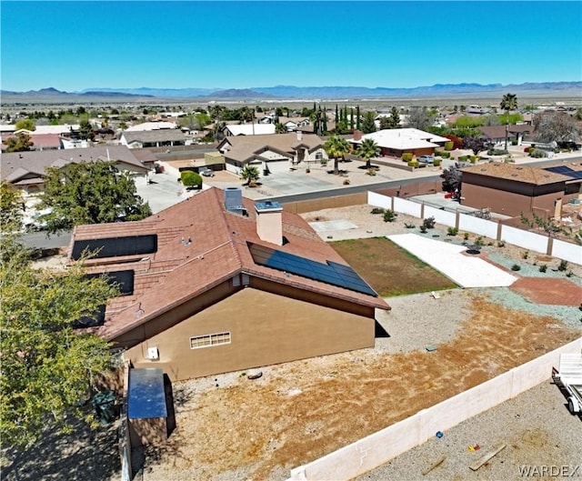 birds eye view of property featuring a residential view and a mountain view