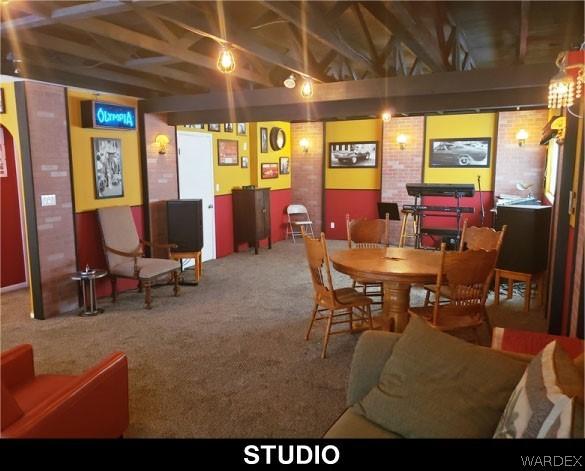 dining room featuring carpet flooring