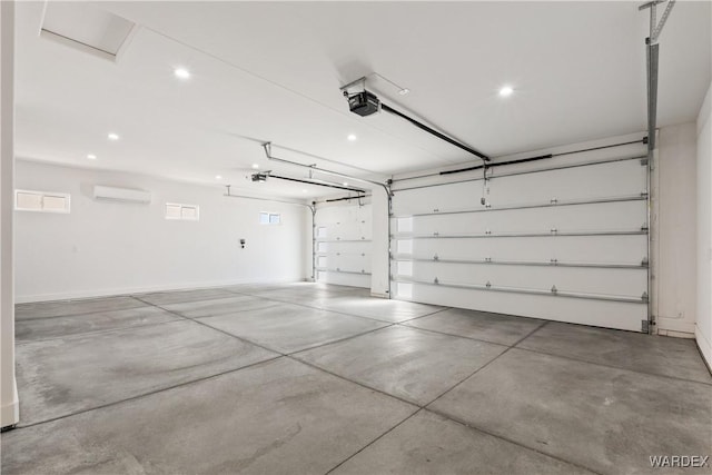 garage featuring a garage door opener, recessed lighting, and an AC wall unit