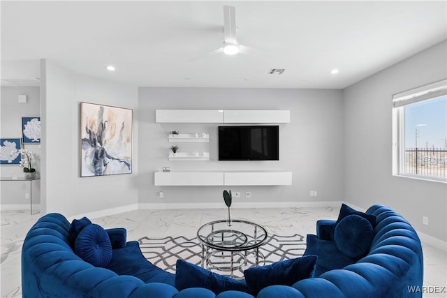 living room featuring recessed lighting, marble finish floor, visible vents, and baseboards