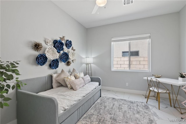 bedroom featuring a ceiling fan, marble finish floor, visible vents, and baseboards