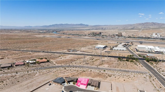 drone / aerial view with a desert view and a mountain view