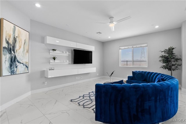 living area with marble finish floor, ceiling fan, baseboards, and recessed lighting