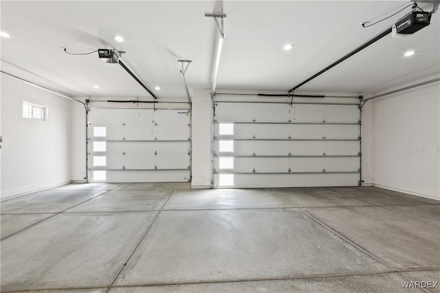 parking garage featuring a garage door opener