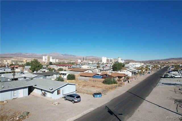 bird's eye view with a residential view and a mountain view