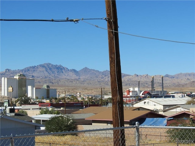 mountain view featuring a view of city