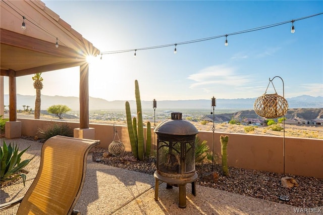 view of patio featuring a mountain view