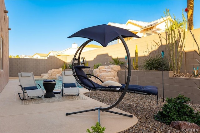 view of patio featuring a fenced backyard