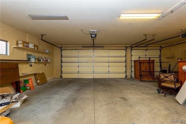 garage featuring a garage door opener