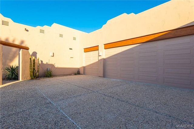 garage with driveway