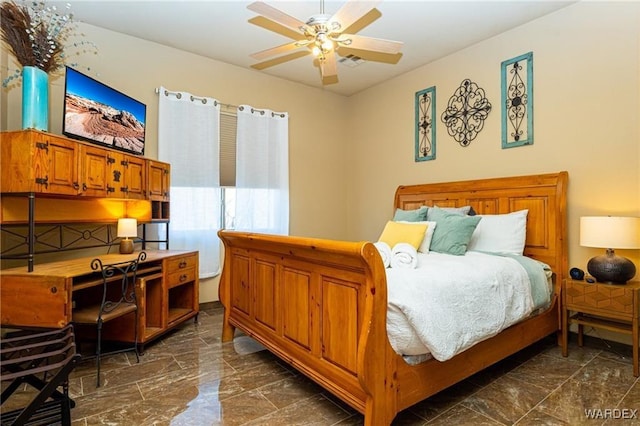 bedroom with a ceiling fan, marble finish floor, and visible vents