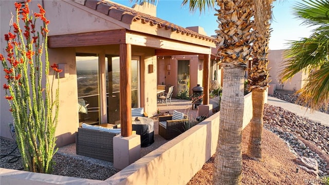 view of patio with fence and an outdoor living space