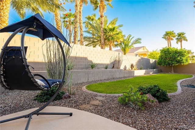 view of yard with a fenced backyard