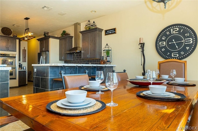 dining space featuring visible vents