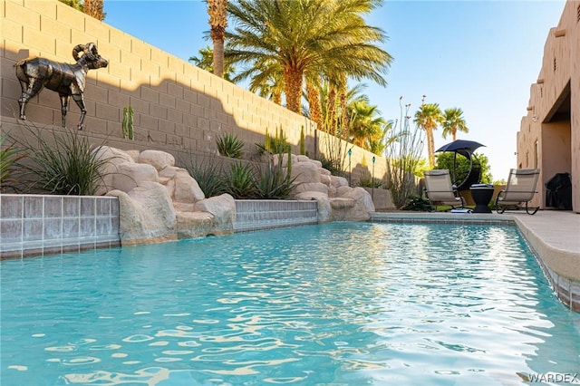 view of pool featuring a fenced backyard and a fenced in pool