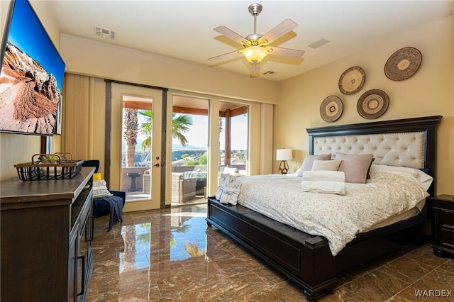 bedroom featuring marble finish floor, visible vents, and access to exterior