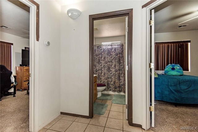 2355 Morningside Dr, Bullhead City, AZ 86442 - corridor featuring baseboards, visible vents, and light tile patterned floors