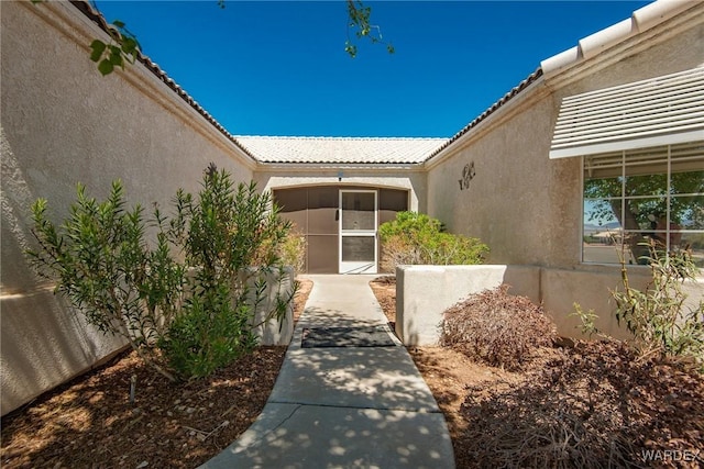 2355 Morningside Dr, Bullhead City, AZ 86442 - entrance to property with a tile roof and stucco siding
