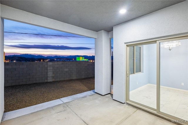 patio terrace at dusk with fence