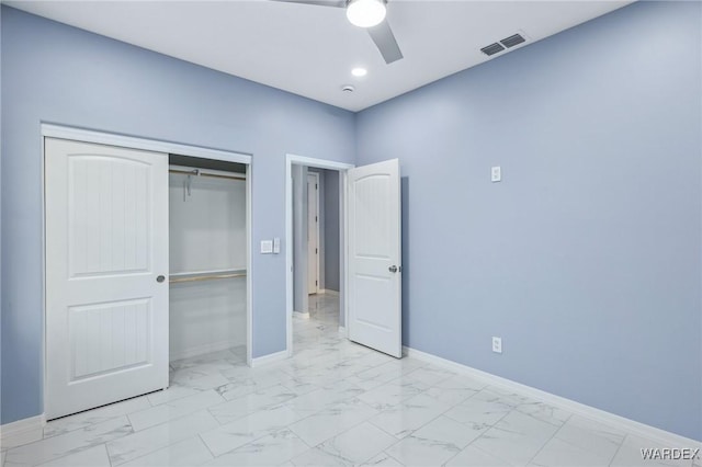 unfurnished bedroom featuring recessed lighting, visible vents, baseboards, marble finish floor, and a closet